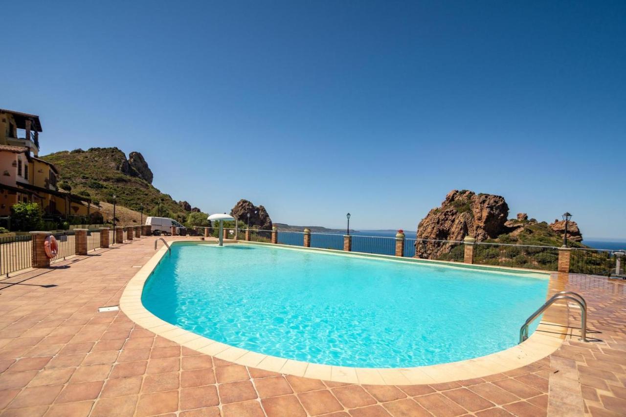 L'Estasi Tanca Piras A Bordo Piscina Con Vista Mare Villa Nebida Bagian luar foto